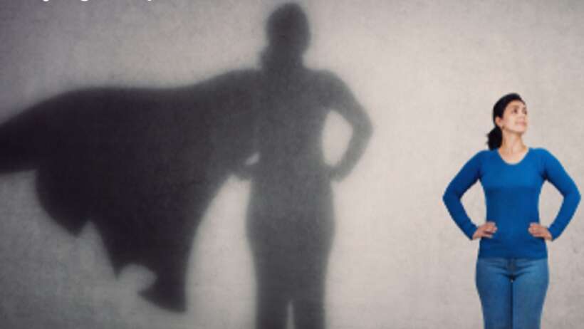 Woman with superhero shadow: Exploring consciousness