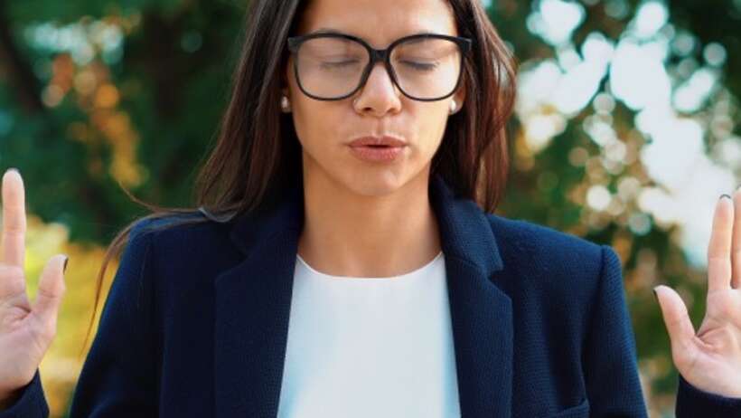 Woman meditating: One Conscious Breath, Exploring Consciousness