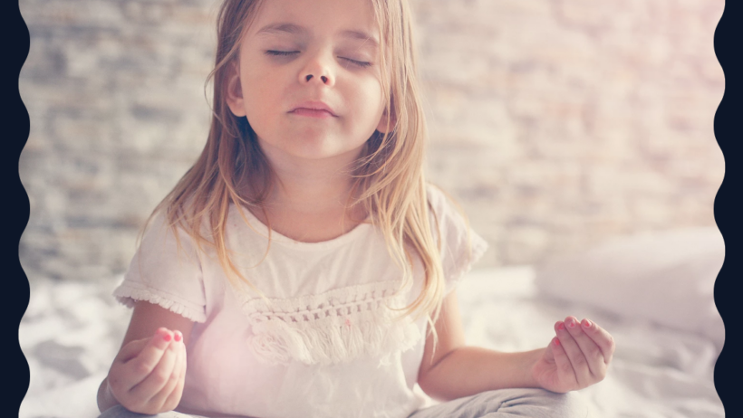 Little girl meditating with eyes closed