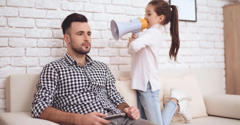 Daughter with megaphone 'speaking' to her dad.