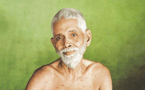 Sri Ramana Maharshi portrait, smiling.